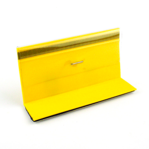 covered yellow chipseal marker