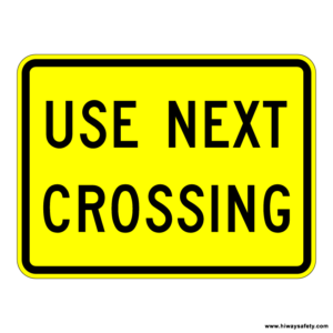 W10-14a USE NEXT CROSSING Sign
