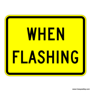 W16-13 WHEN FLASHING Sign